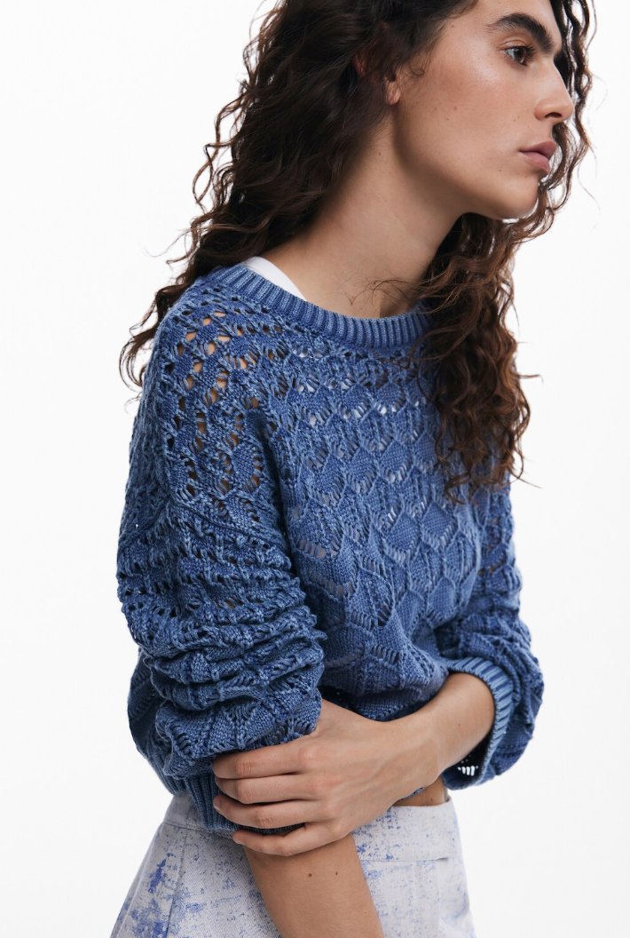 side view of sweater on woman, with sleeves pushed up to elbows