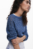 side view of sweater on woman, with sleeves pushed up to elbows