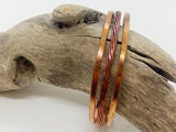 Forge Ahead copper bracelets